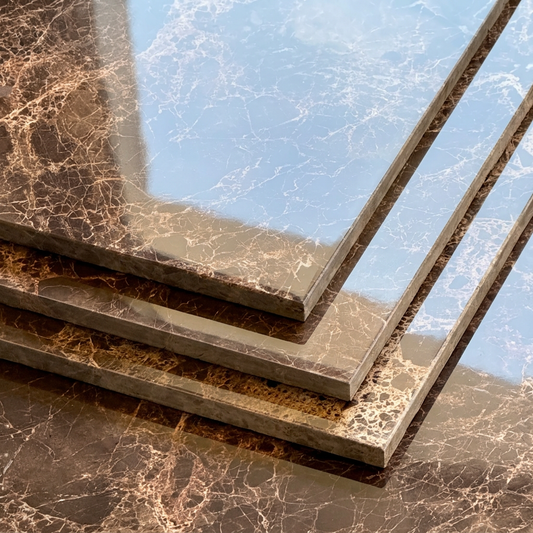 Close-up of brown marble-patterned tiles with a clear blue sky in the background