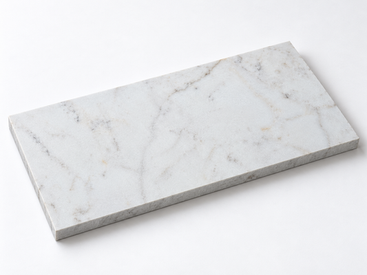 Calacatta Sugar Honed Marble tile, angled view showing the honed face and raw sawn edges