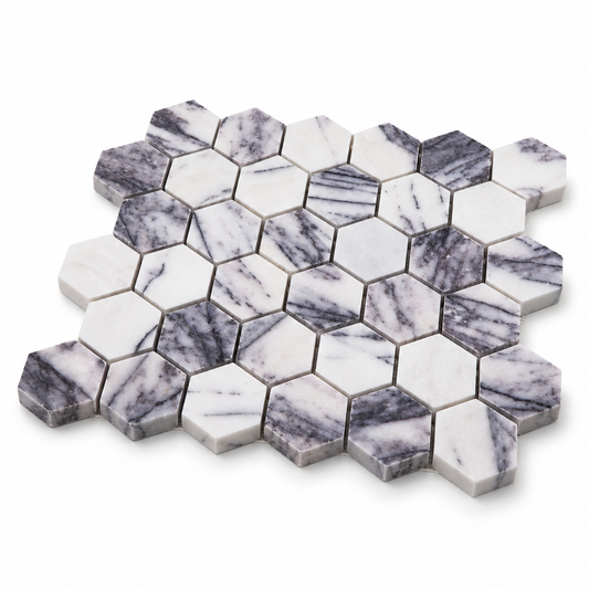 Calacatta Viola Polished Marble Hexagon Mosaic Tiles – angled mosaic sheet showing natural stone edges and mesh backing.