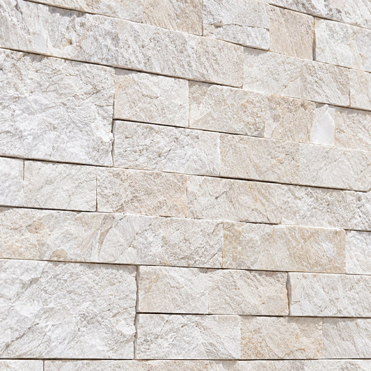 Close-up of Myra split face limestone with ivory tones and a naturally textured surface.