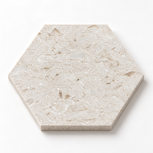 Shellstone brushed limestone hexagon tile, angled view showing the brushed surface and 10 mm edge