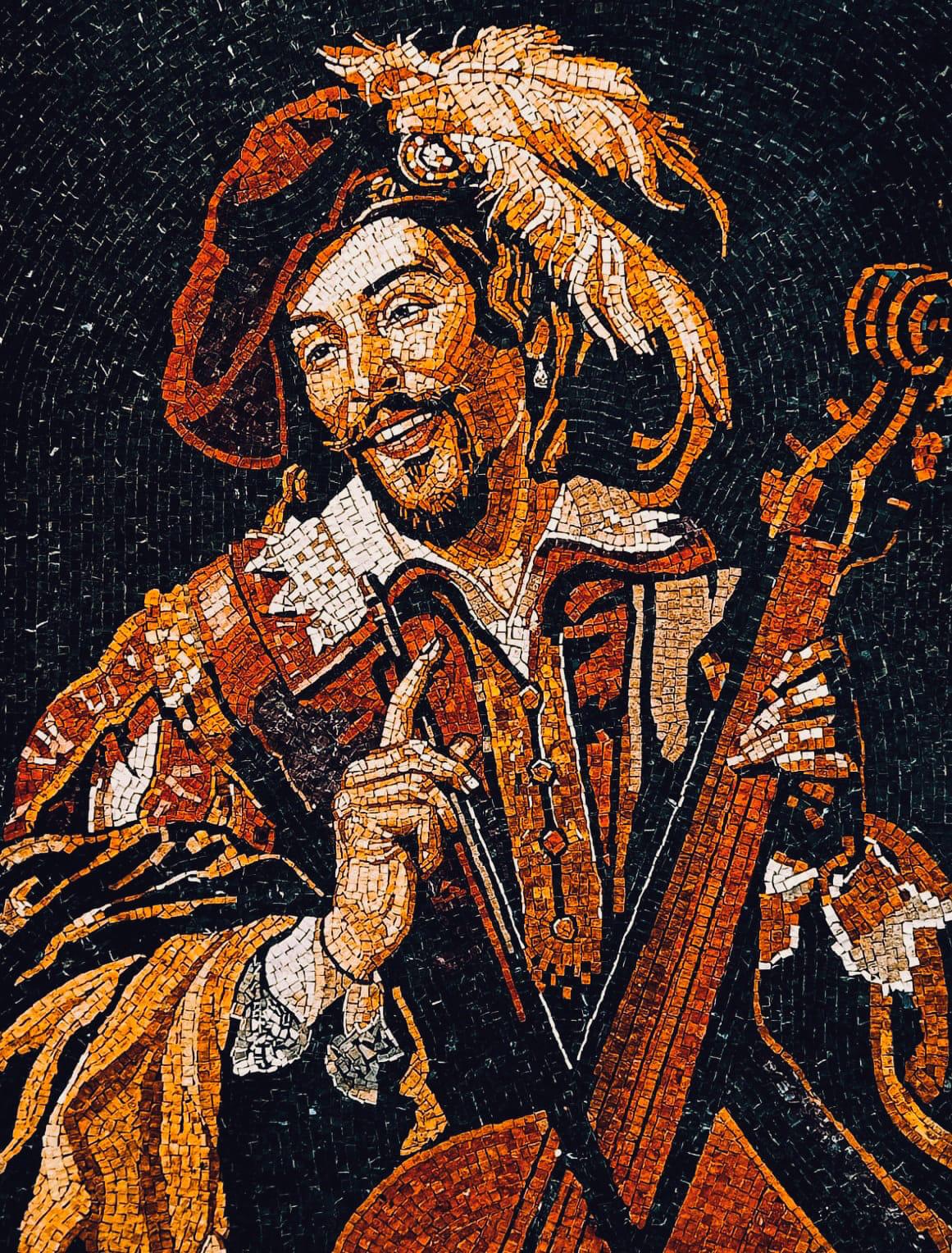 The Midnight Serenade natural stone mosaic art panel depicting a musician with a feathered hat and a bowed string instrument