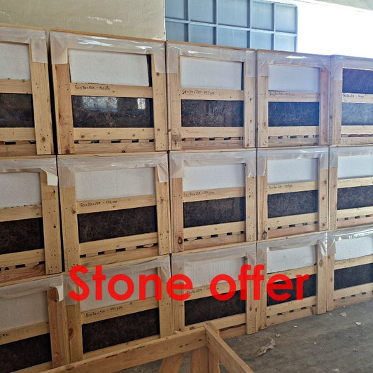 Stack of wooden crates with a 'Stone offer' label in a warehouse setting.