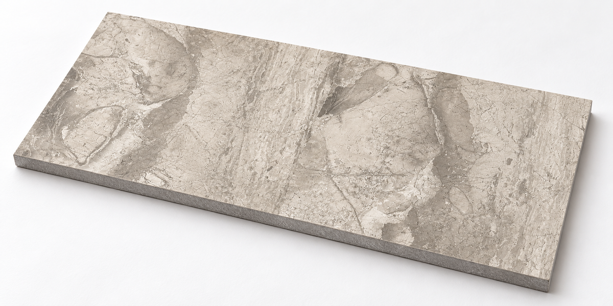Atlantic Grey Honed Marble tile, angled view showing the honed face and raw sawn edges