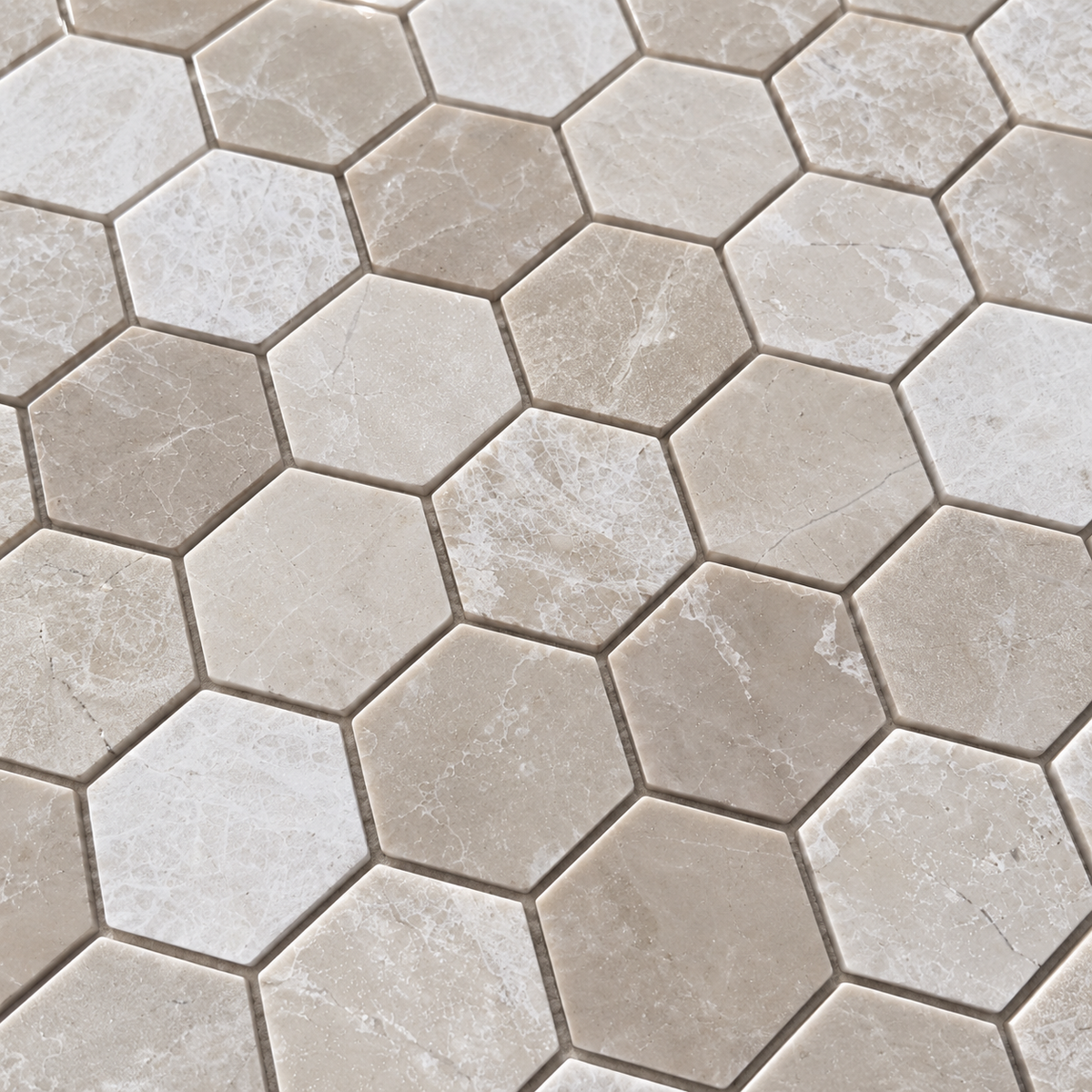 Belgravia Beige Polished Marble Hexagon Mosaic Tiles 48x48: close-up of the natural stone texture, pattern and grout joints