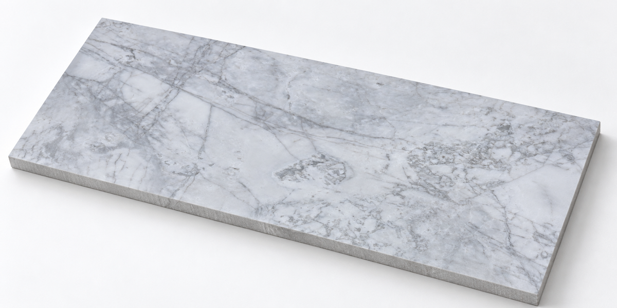 Calacatta Nimbus Cloud Honed Marble tile, angled view showing the honed face and raw sawn edges