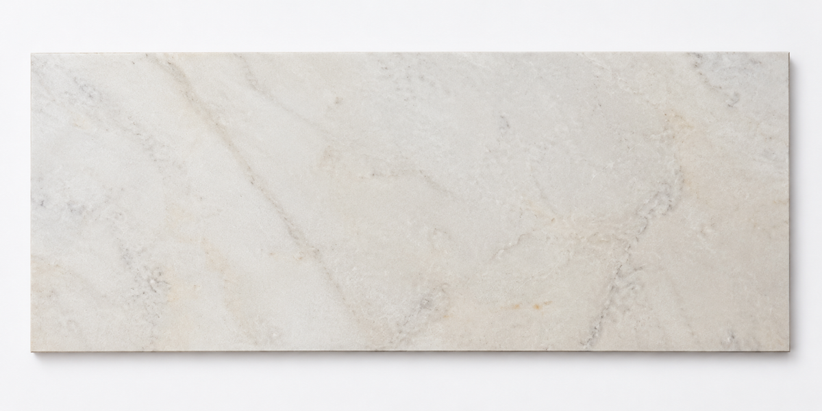 Calacatta Royale Vein White Honed Marble tile, front view showing the natural stone markings