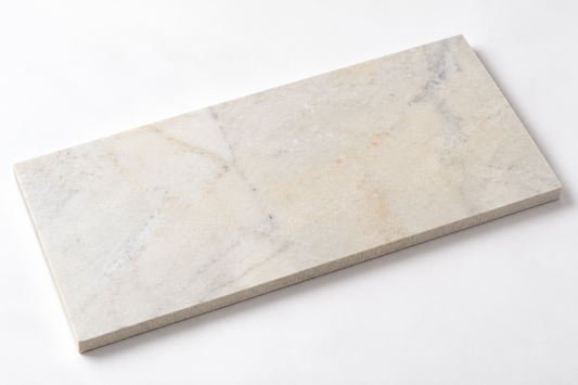 Calacatta Royale Vein White Honed Marble tile, angled view showing the honed face and raw sawn edges