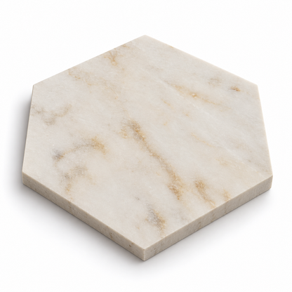 Calacatta Sugar honed marble hexagon tile, angled view showing the matte face and 10 mm raw sawn edges