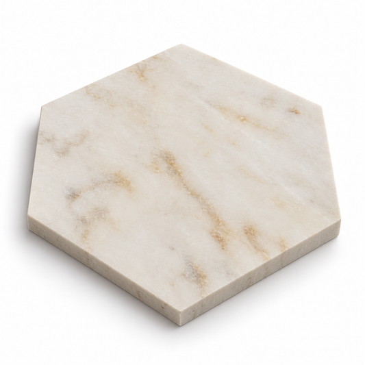 Calacatta Sugar honed marble hexagon tile, angled view showing the matte face and 10 mm raw sawn edges