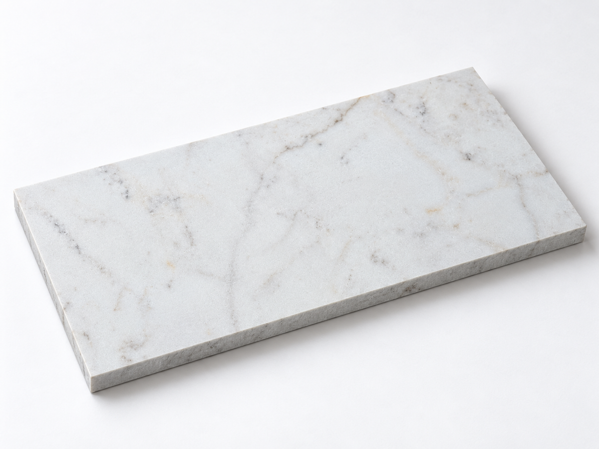 Calacatta Sugar Honed Marble tile, angled view showing the honed face and raw sawn edges