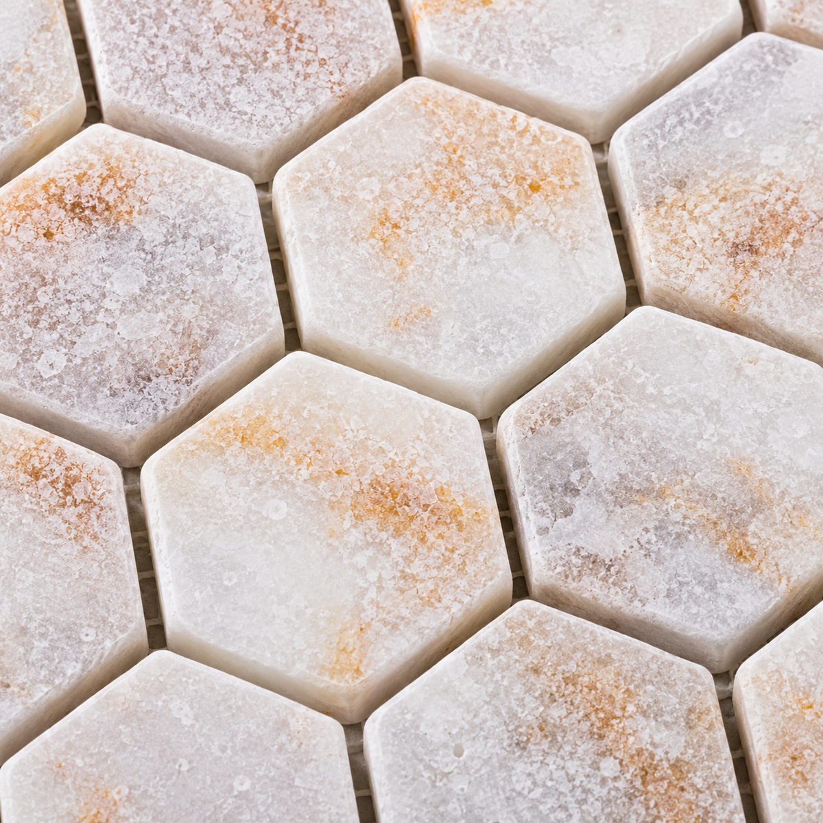 Calacatta Sugar Tumbled Marble Hexagon Mosaic Tiles 48x48 – close-up of the stone surface and mosaic joints.