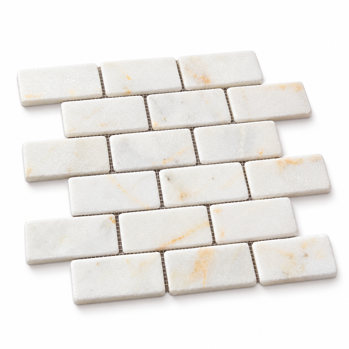 Calacatta Sugar Tumbled Marble Brick Mosaic Tiles 50x100: angled sheet view showing stone edges and thickness