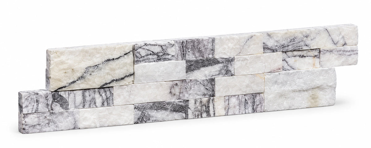 Angled view of a Calacatta Viola split face marble ledger panel with stepped ends on a white background.