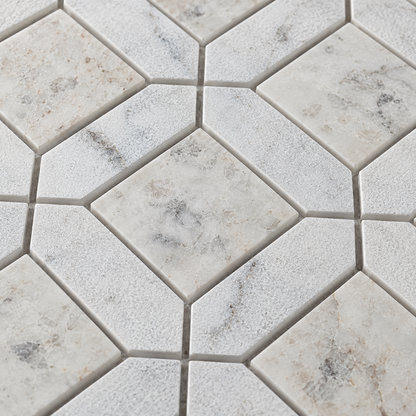 Carrara White - Nimbus Honed Marble Window Mosaic Tiles – close-up of the stone surface and mosaic joints.
