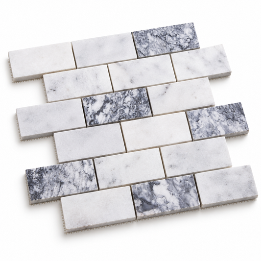 Carrara White - Platinum Grey Honed Marble Brick Mosaic Tiles — angled sheet showing natural marble edges and mesh backing