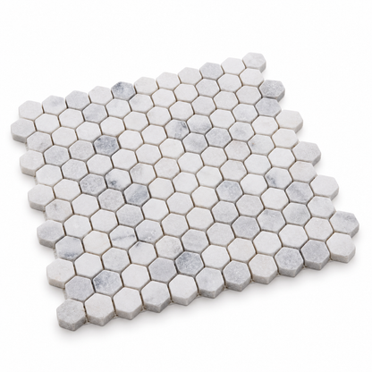 Carrara White Tumbled Marble Hexagon Mosaic Tile 23x23 — angled sheet showing 10 mm marble edges and mesh backing