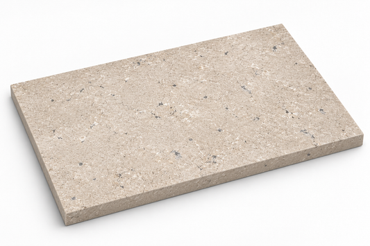 Dijon brushed limestone tile, 900 x 600 mm, showing the textured face and 30 mm edge