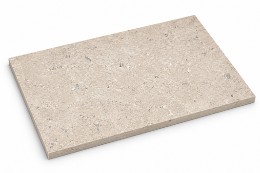 Angled view of a Dijon honed limestone 600 x 400 mm tile showing its smooth matt surface and slim stone edge.
