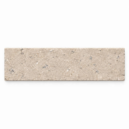Dijon seasoned limestone paving cobble, 200 x 50 mm, front view showing beige-grey mineral detail