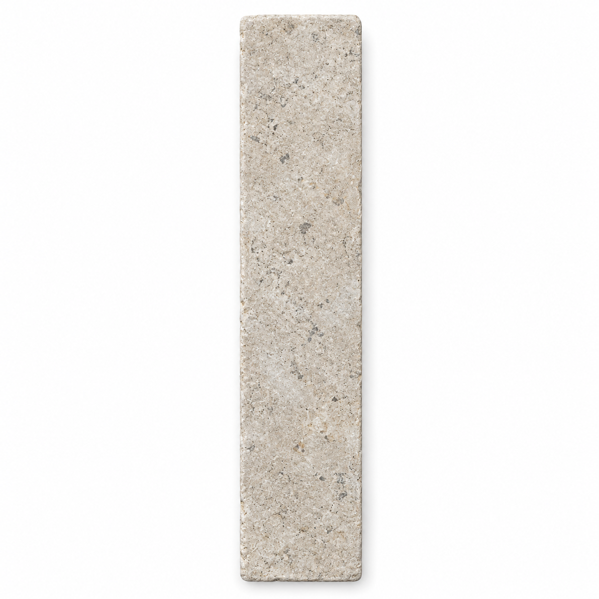 Dijon tumbled limestone 50 x 200 mm herringbone tile viewed from above, showing natural grey-beige markings and softened edges.