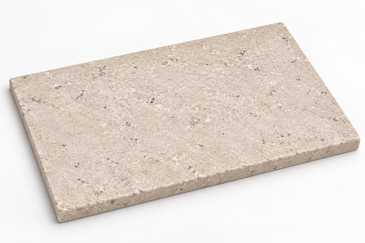 Dijon tumbled limestone tile, 900 x 600 mm, showing the 30 mm edge and softly aged corners