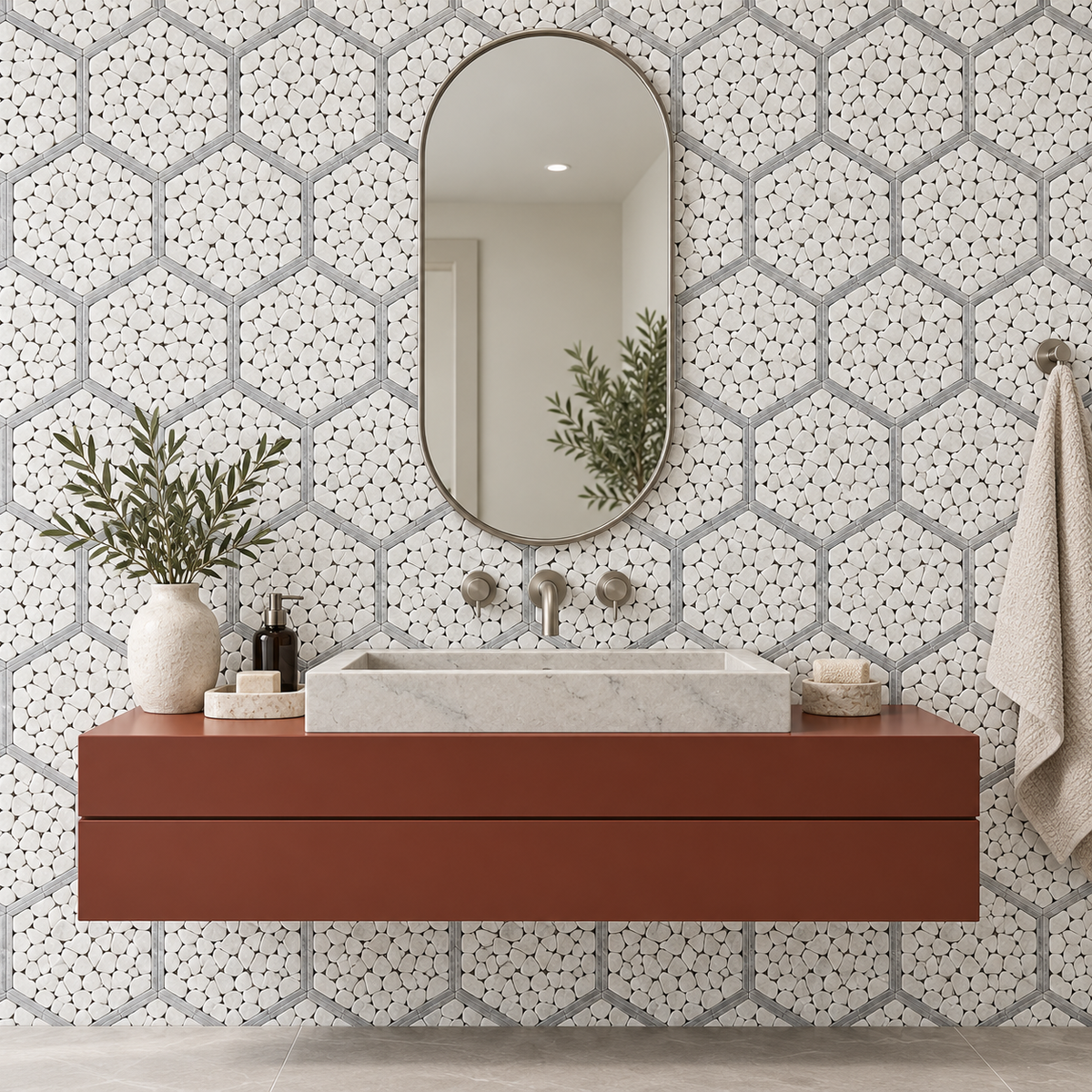 Framed Pebble Hexagon Carrara White and Platinum Grey Tumbled Marble Mosaic Tile — installed on a windowless bathroom feature wall