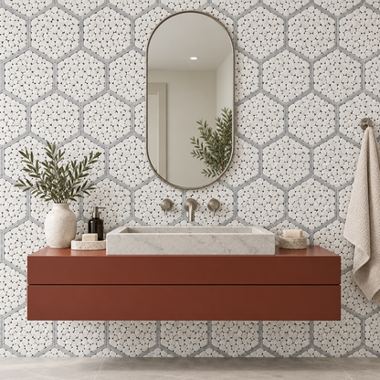 Framed Pebble Hexagon Carrara White and Platinum Grey Tumbled Marble Mosaic Tile — installed on a windowless bathroom feature wall