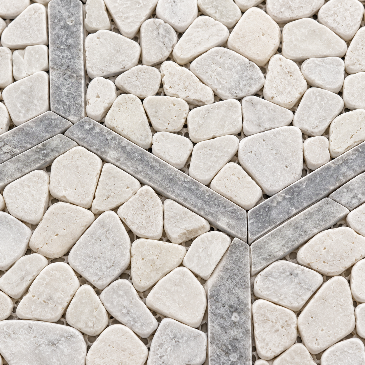 Framed Pebble Hexagon Carrara White and Platinum Grey Tumbled Marble Mosaic Tile — macro close-up of natural stone texture and mosaic joints