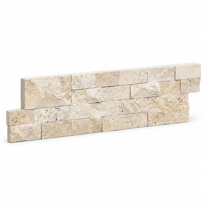 Angled view of a light travertine split face ledger panel with stepped ends on a white background.