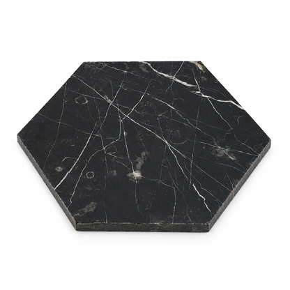 Nero Marquina Honed Hexagon Marble Wall & Floor Tiles: angled view showing natural stone face and thin raw sawn edges