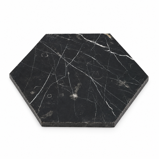 Nero Marquina Honed Hexagon Marble Wall & Floor Tiles: angled view showing natural stone face and thin raw sawn edges