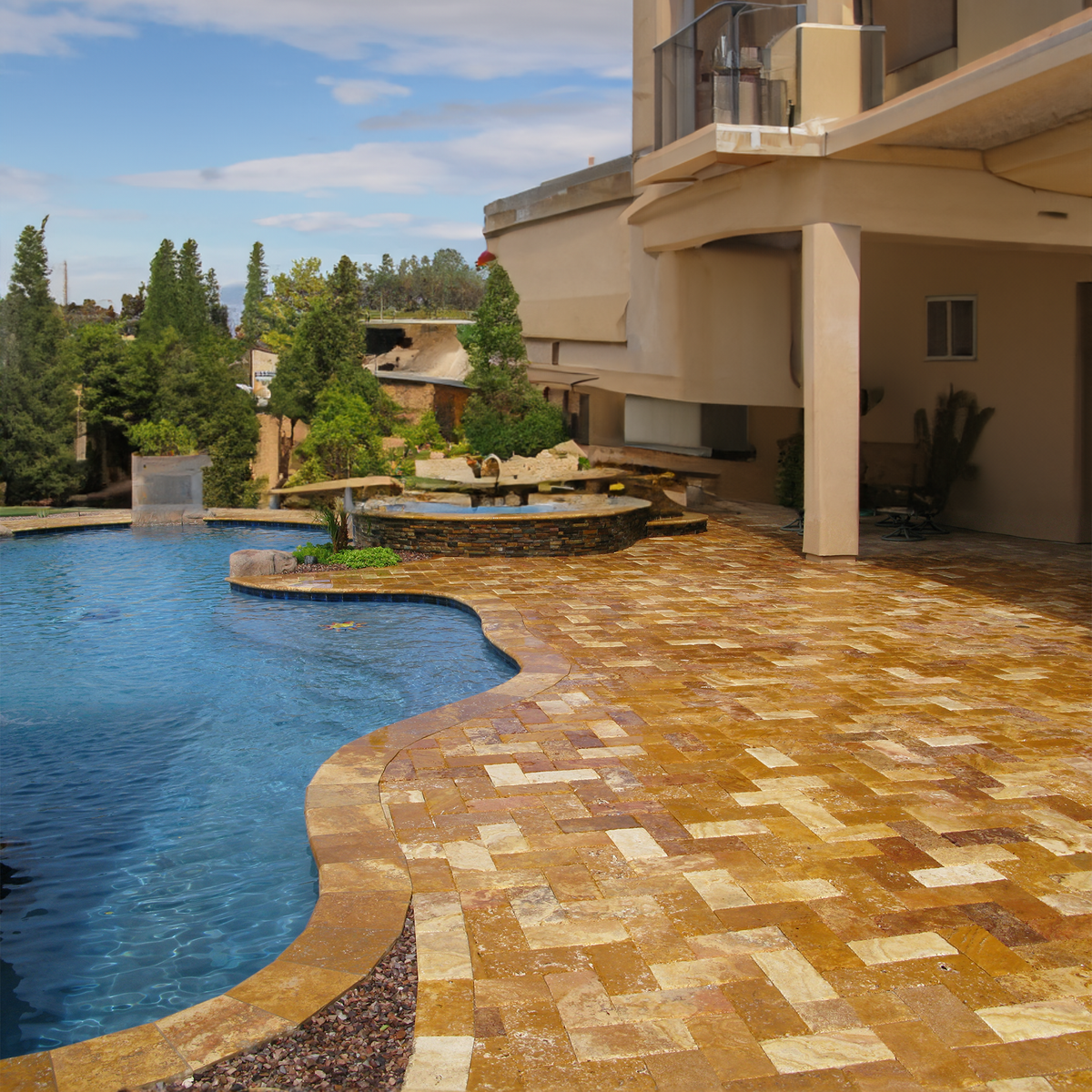 Walnut travertine Versailles pattern paving around a garden swimming pool