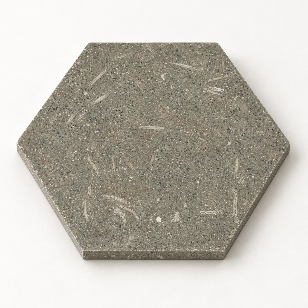 Rustic Green honed limestone hexagon tile, angled view showing the smooth matt surface and 10 mm edge
