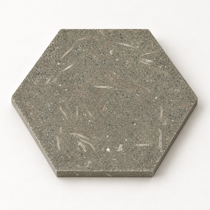 Rustic Green honed limestone hexagon tile, angled view showing the smooth matt surface and 10 mm edge