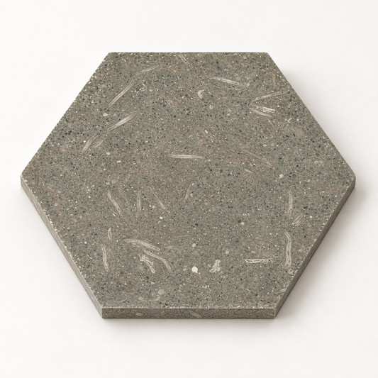 Rustic Green honed limestone hexagon tile, angled view showing the smooth matt surface and 10 mm edge