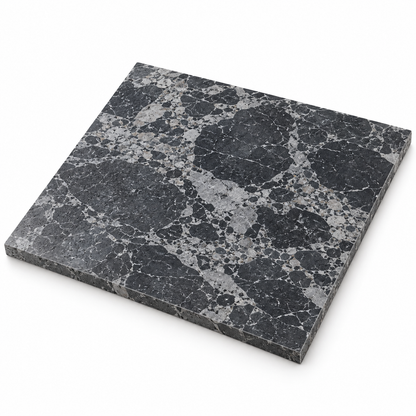 Selene Pitted Marble Wall & Floor Tiles: angled view showing the stone face and raw sawn edges