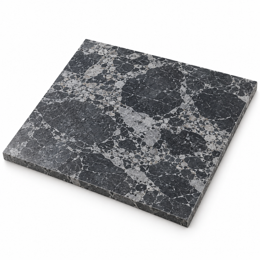 Selene Pitted Marble Wall & Floor Tiles: angled view showing the stone face and raw sawn edges