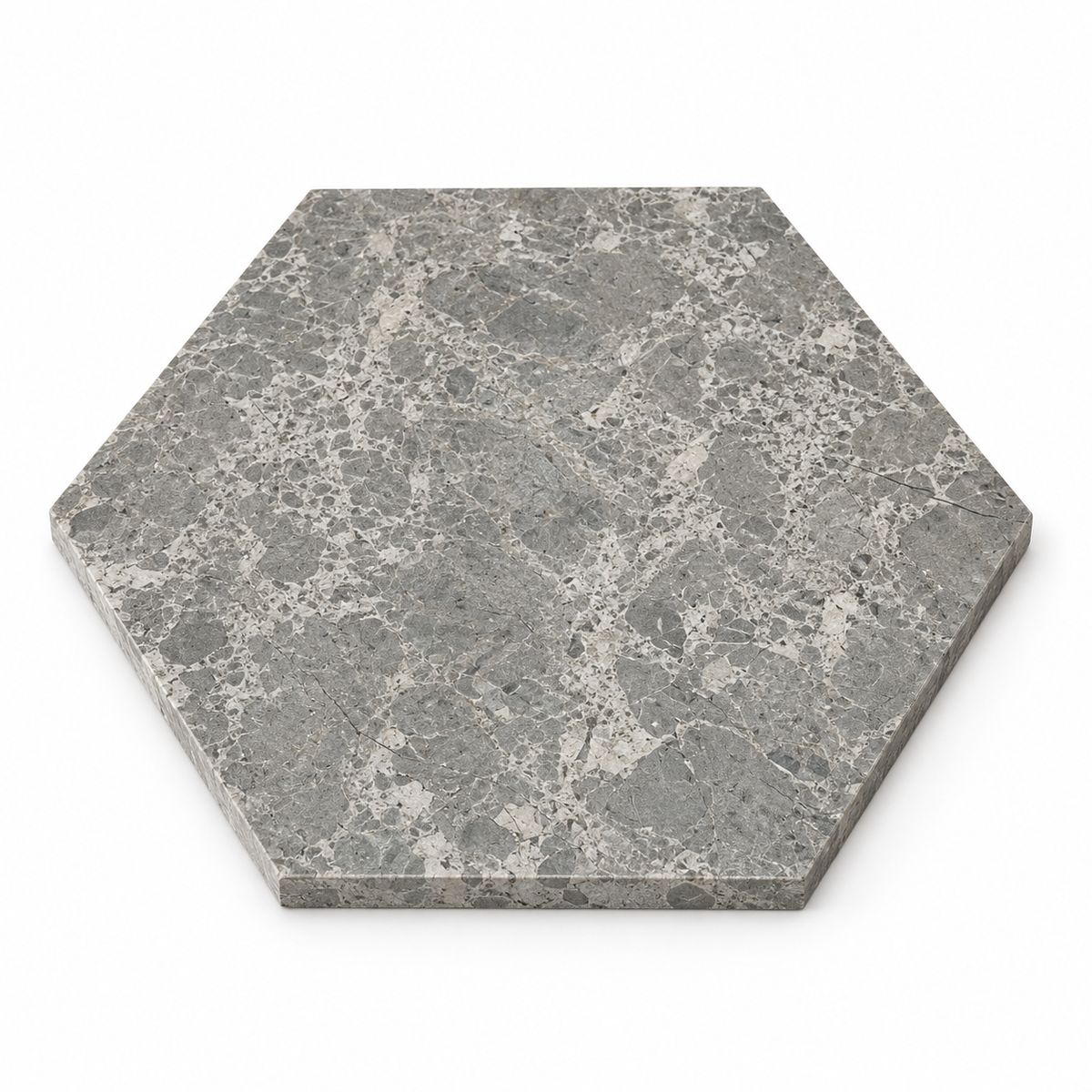 Silver Shadow Honed Hexagon Marble Wall & Floor Tiles: angled view showing the stone face and raw sawn edges